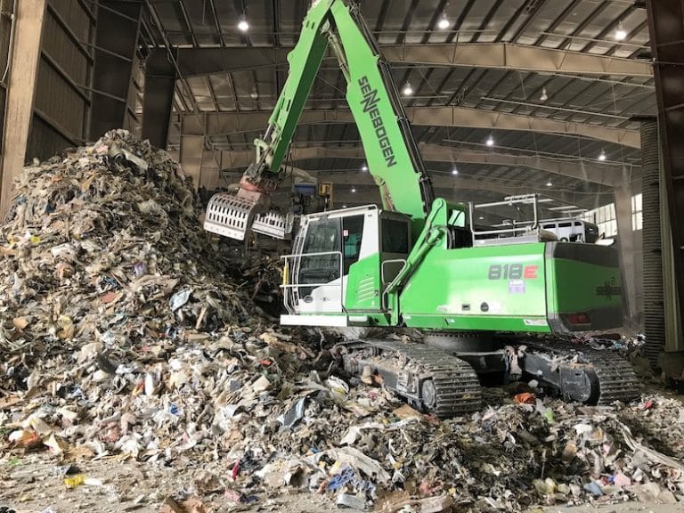 818 R Crawler Machine in a Dusty Working Area Recycling Plant in the US Working with Third SENNEBOGEN Material Handler