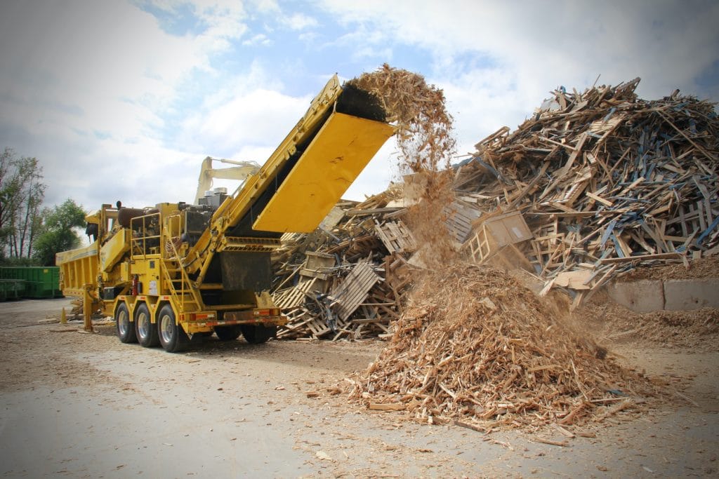 The WasteAway HG6000 horizontal grinder is set up to grind material to under 3”(7.6 cm) in size using a hex shape screen.