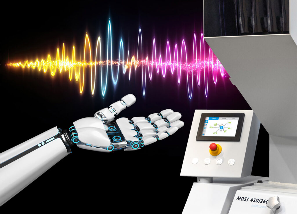 Robotic hand beneath a colourful vibration waveform next to the Smart Control touchscreen panel of a Hellweg MDSi 410/260 granulator