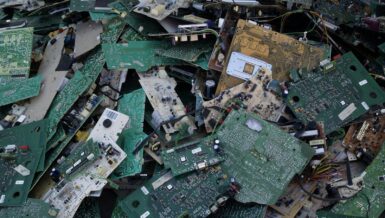 Pile of discarded printed circuit boards as input material for recycling and sampling